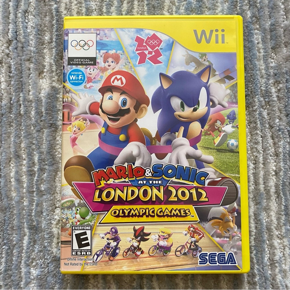 Wii game Mario + Sonic at the London 2012 Olympics, like new, no scratches on cd
